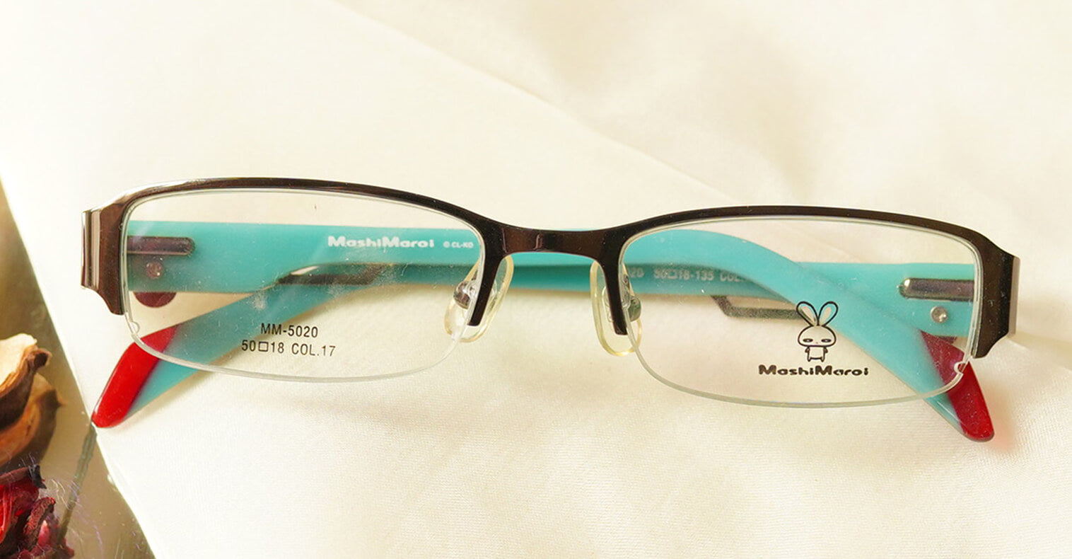 Formidable Eyeglasses - Blue placed on the table