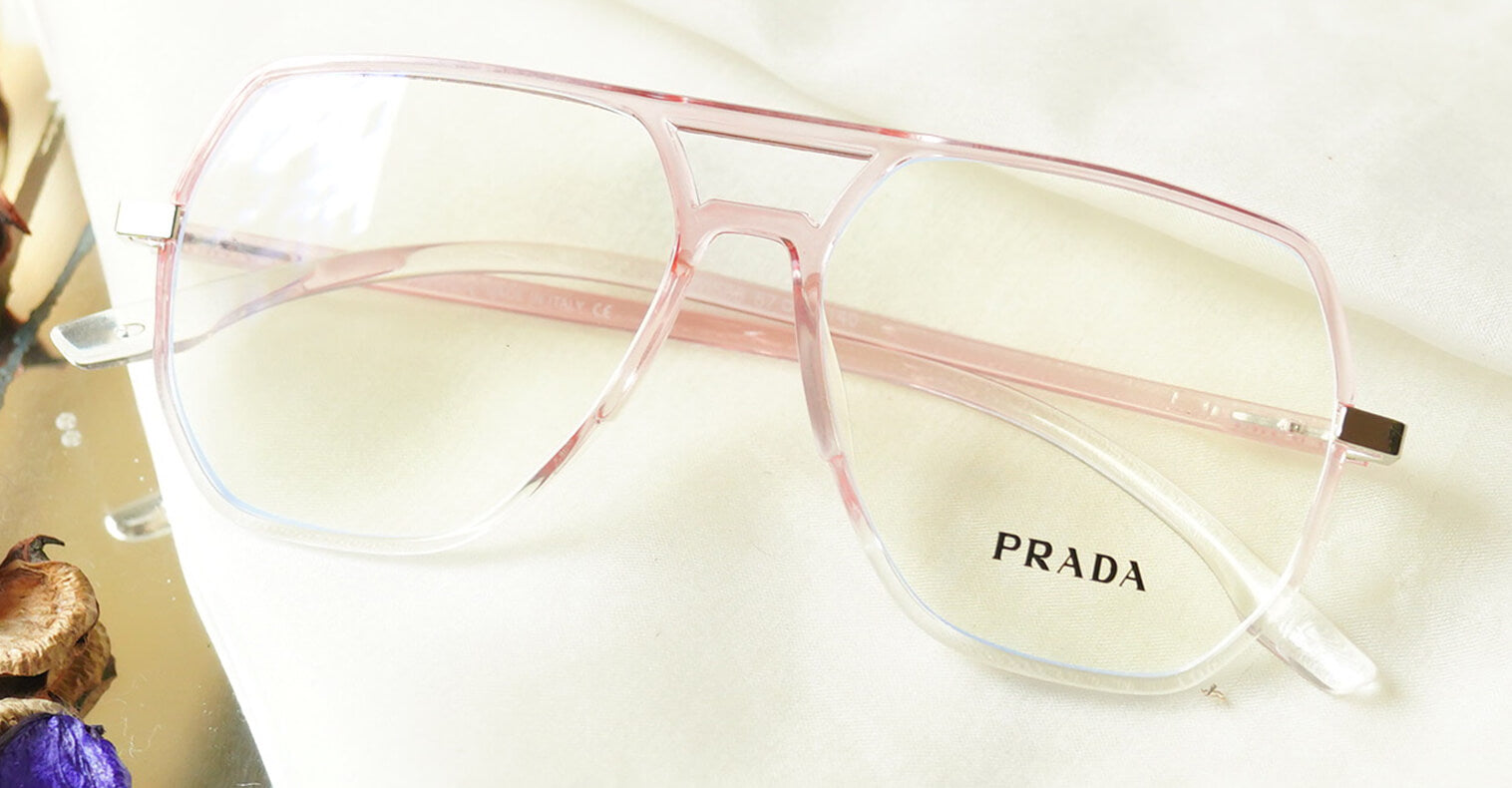 Flowery Eyeglasses - Pink placed on the table
