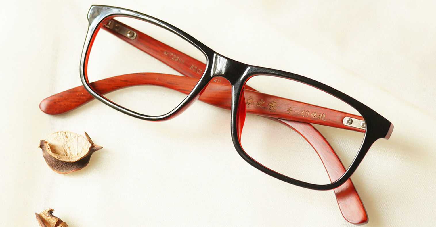Superieur Eyeglasses - Brown placed on the table