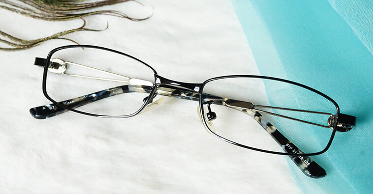 Rectangle metal glasses placed on the table