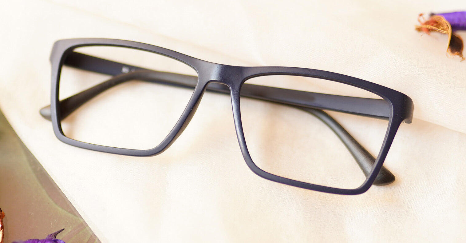 Bonafide Eyeglasses - Blue placed on the table