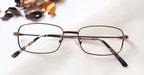 Diligent Eyeglasses - Silver placed on the table