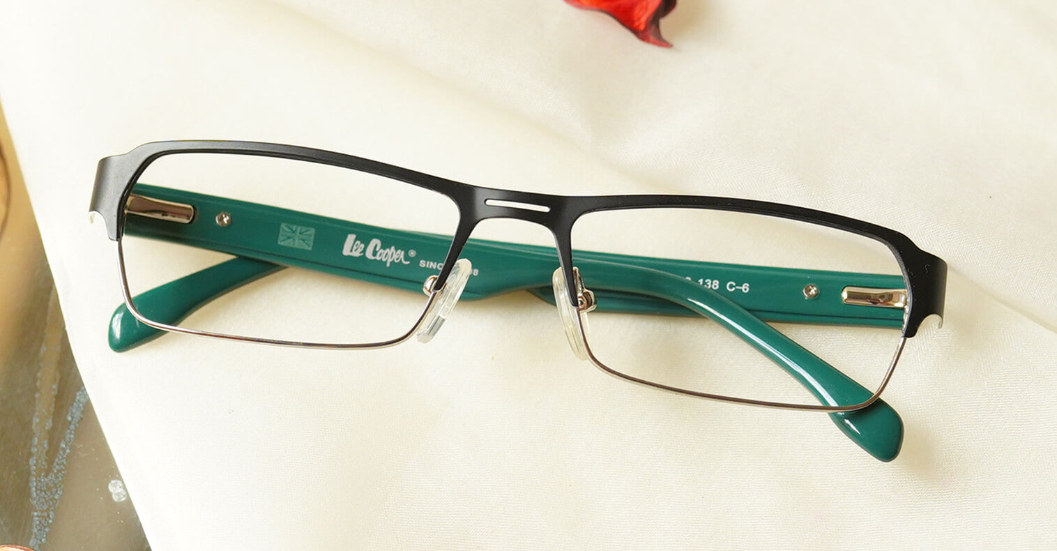 Dunky Blue Cut Eyeglasses placed on the table