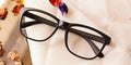 Sublime Blue Cut Eyeglasses placed on the table