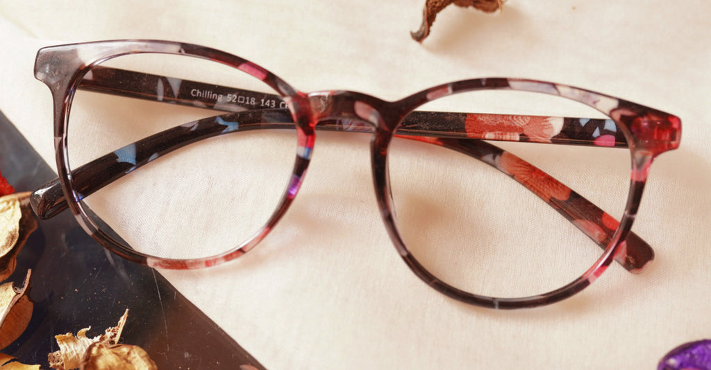 Swah multi colour eyeglasses placed on the table