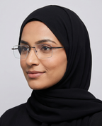 Woman wearing Kikina rimless eyeglasses