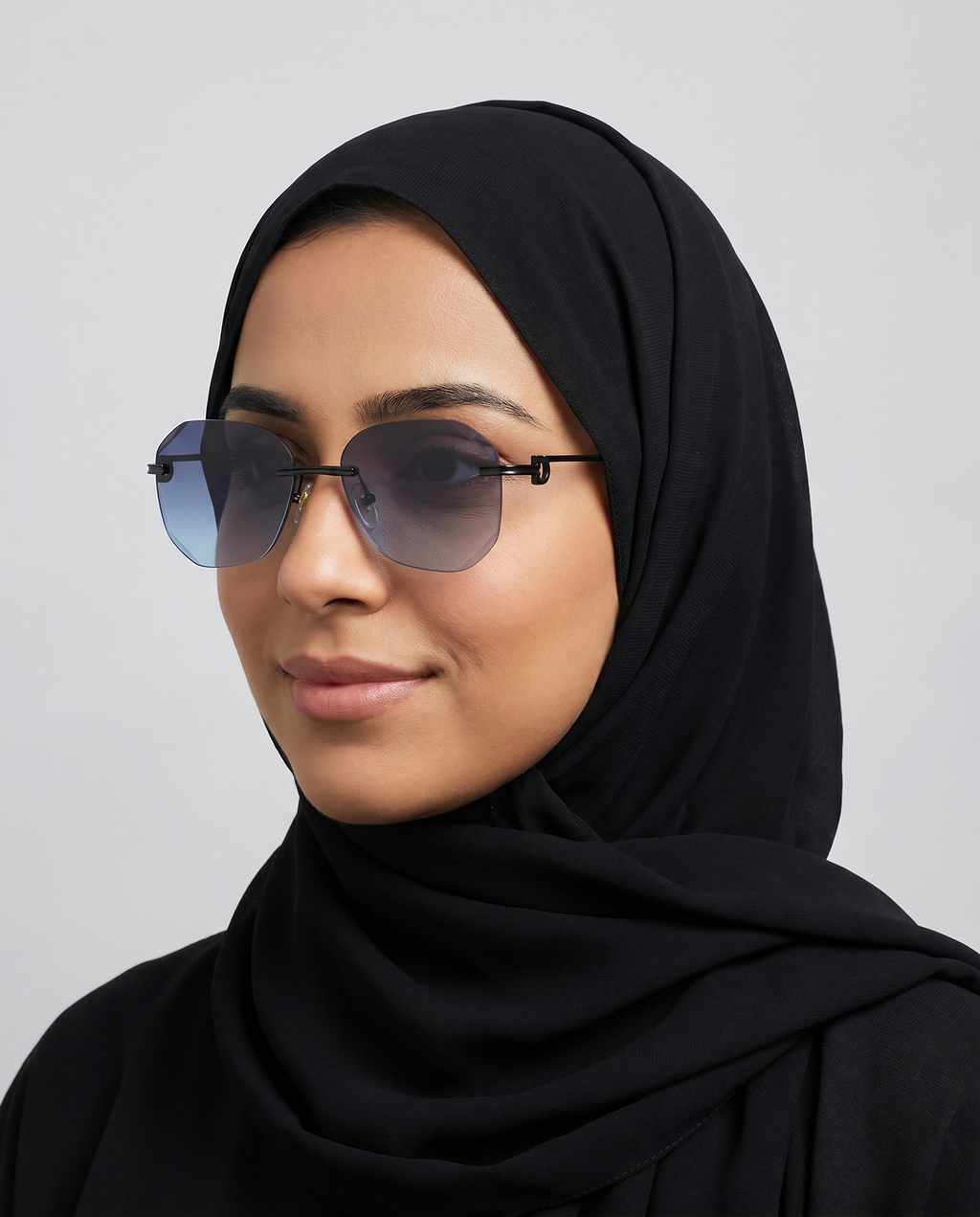Woman wearing Plima rimless eyeglasses