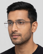Man wearing Kikina rimless eyeglasses