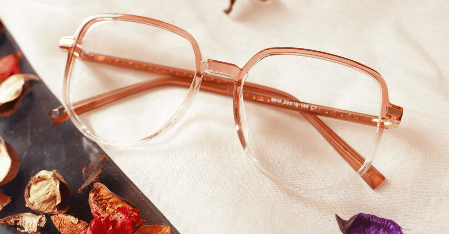 Virteous eyeglasses - Brownish transparent placed on the table