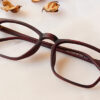 front side of Paramount red colored square shape eyeglasses frame