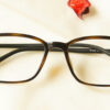 Poney Eyeglasses placed on the table